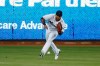 Miami Marlins right fielder Cesar Puello fields a ball hit by San Diego Padres' Manny Machado during the first inning a baseball game Wednesday, July 17, 2019, in Miami. (AP Photo/Wilfredo Lee)