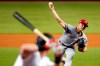 Cincinnati Reds' Sonny Gray, right, pitches to Miami Marlins' Garrett Cooper during the first inning of a baseball game Monday, Aug. 26, 2019, in Miami. (AP Photo/Wilfredo Lee)