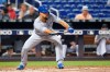 Kansas City Royals' Jorge Lopez bunts during the third inning of a baseball game against the Miami Marlins, Friday, Sept. 6, 2019, in Miami. (AP Photo/Wilfredo Lee)