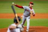Cincinnati Reds' Luis Castillo pitches to Miami Marlins' Jon Berti during the first inning of a baseball game Tuesday, Aug. 27, 2019, in Miami. (AP Photo/Wilfredo Lee)