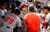 Washington Nationals' Trea Turner, center, is congratulated by teammates after Turner hit a three-run home run during the fourth inning of the team's baseball game against the Miami Marlins, Tuesday, June 25, 2019, in Miami. (AP Photo/Wilfredo Lee)