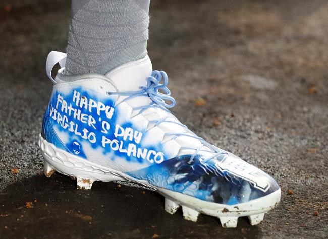 Pittsburgh Pirates' Gregory Polanco wears cleats decorated for Father's Day during the third inning of a baseball game against the Miami Marlins, Sunday, June 16, 2019, in Miami. (AP Photo/Wilfredo Lee)
