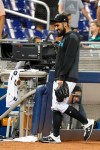 Miami Marlins relief pitcher Sergio Romo walks back to the clubhouse after of a baseball game against the Arizona Diamondbacks, Saturday, July 27, 2019, in Miami. The AL Central-leading Minnesota Twins acquired the 36-year-old righty from Miami on Saturday night, hoping to boost their beleaguered bullpen for the stretch. (AP Photo/Wilfredo Lee)