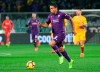 Fiorentina's Luis Muriel runs with the ball during the Italian Cup quarterfinal soccer match between Fiorentina and Roma, at the Artemio Franchi stadium in Florence, Italy, Wednesday, Jan. 30, 2019. (Claudio Giovannini/ANSA via AP)