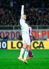 Atalanta's Marten de Roon celebrates after scoring his side's 3rd goal during the Italian Cup first leg semifinal soccer match between Fiorentina and Atalanta, at the Artemio Franchi stadium, in Florence, Italy, Wednesday, Feb. 27, 2019. (Claudio Giovannini/ANSA via AP)