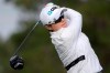 Eun-Hee Ji, of South Korea, tees off on the 17th hole during the final round of the Tournament of Champions LPGA golf tournament Sunday, Jan. 20, 2019, in Lake Buena Vista, Fla. (AP Photo/Phelan M. Ebenhack)