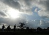 Tiger Woods, right, walks down the fifth fairway during a pro-am event before the Honda Classic golf tournament in Palm Beach Gardens, Fla., Wednesday, Feb. 29, 2012. (AP Photo/Rainier Ehrhardt)