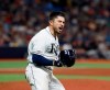 Tampa Bay Rays Travis d'Arnaud reacts to hitting the game-winning home run against the New York Yankees in a baseball game Saturday, July 6, 2019, in St. Petersburg, Fla. (AP Photo/Scott Audette)