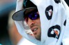 Miami Marlins' Martin Prado is seen in the dugout during an exhibition spring training baseball game against the Washington Nationals Friday, March 1, 2019, in Jupiter, Fla. (AP Photo/Jeff Roberson)