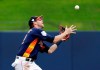 Houston Astros left fielder Josh Reddick catches a fly ball by New York Mets' Jeff McNeil for an out during the fourth inning of an exhibition spring training baseball game Monday, Feb. 25, 2019, in West Palm Beach, Fla. (AP Photo/Jeff Roberson)