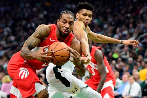 Toronto Raptors forward Kawhi Leonard (2) steals the ball from Milwaukee Bucks forward Giannis Antetokounmpo (34) during first half action in Game 5 of the NBA Eastern Conference final in Milwaukee on Thursday, May 23, 2019. THE CANADIAN PRESS/Frank Gunn