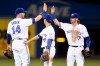 Toronto Blue Jays' Justin Smoak, left to right, Darwin Barney and Josh Donaldson celebrate after defeating the New York Yankees 7-0 in MLB baseball action in Toronto, Wednesday, June 1, 2016. THE CANADIAN PRESS/Frank Gunn