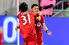 Toronto FC midfielder Marco Delgado (8) celebrates his goal with teammate Tsubasa Endoh (31) during first half MLS playoff soccer action against the D.C. United, in Toronto on Saturday, Oct. 19, 2019. THE CANADIAN PRESS/Frank Gunn