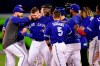 Toronto Blue Jays first baseman Justin Smoak (second left) is mobbed by temmates after driving in the game-winning run against the Oakland Athletics during 11th inning American League baseball action in Toronto on Sunday, April 28, 2019. THE CANADIAN PRESS/Frank Gunn