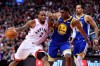Toronto Raptors forward Kawhi Leonard (2) drives up court as Golden State Warriors centre Kevon Looney (5) defends during second half basketball action in Game 1 of the NBA Finals in Toronto on Thursday, May 30, 2019. THE CANADIAN PRESS/Frank Gunn