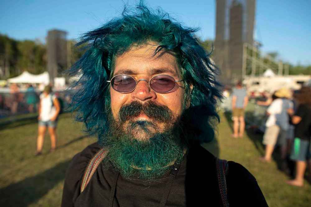 ANDREW RYAN / WINNIPEG FREE PRESS
Charlie Blankenship walks around the Folk Fest grounds, Friday.