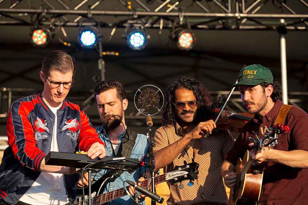 ANDREW RYAN / WINNIPEG FREE PRESS
Members of Darlingside perform on the main stage at Folk Fest in Birds Hill Provincial Park, Friday.