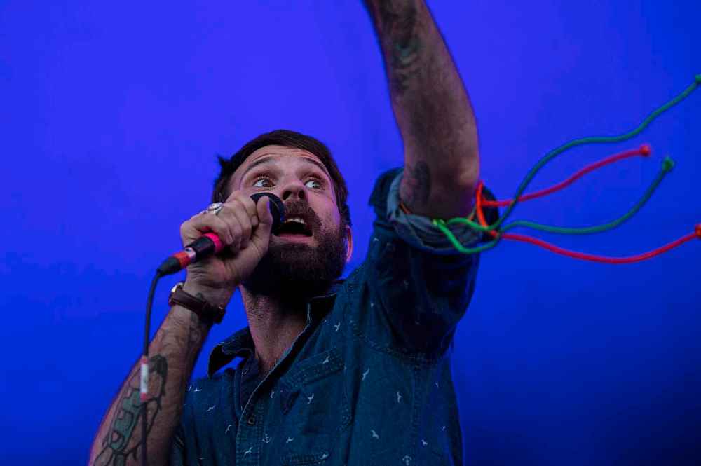 The Winnipeg Free Press
ANDREW RYAN / WINNIPEG FREE PRESS Simon Ward, lead singer of The Strumbellas, sings during their performance on the main stage at Folk Fest in Red Hill Provincial Park on July 6, 2018.
