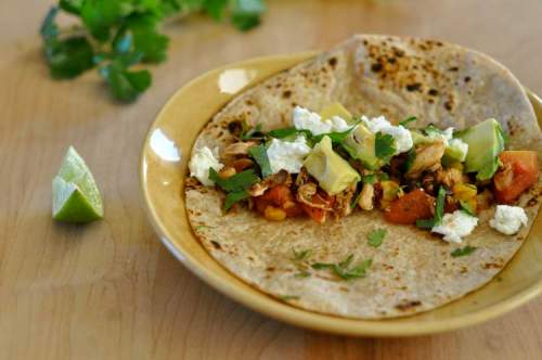 Ellise Pierce / Tribune Media / MCT
Chicken tinga. While some tortillas are occasionally rolled and fried, nowhere in Mexico will you find the curiously orange, seasoned ground beef that used to pass for taco filling north of the U.S. border.