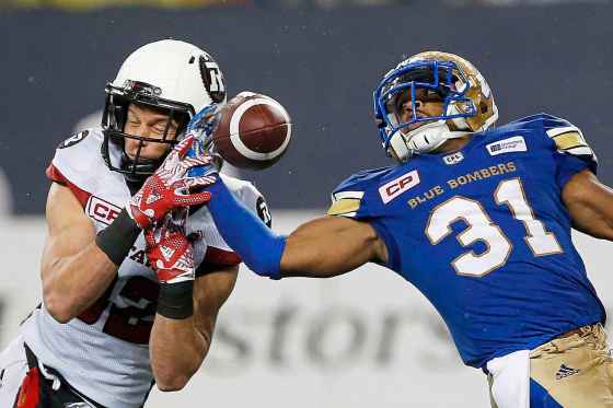 THE CANADIAN PRESS/John WoodsWinnipeg Blue Bombers' Maurice Leggett intercepts a pass intended for Ottawa Redblacks' Greg Ellingson last season. Leggett is one of several Bombers free agents that will need to be signed before next season.