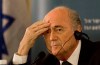 FILE - In this May 19, 2015 file photo FIFA President Sepp Blatter attends a press conference in Jerusalem. Blatter is seeking reelection at the FIFA congress in Zurich where six soccer officials were arrested and detained by Swiss police on Wednesday, May 27, 2015 pending extradition at the request of U.S. authorities after a raid at a luxury hotel. The officials are in Switzerland for the FIFA congress and presidential election. (AP Photo/Tsafrir Abayov)