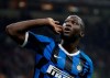 FILE - In this Saturday, Sept.21, 2019 file photo, Inter Milan's Romelu Lukaku celebrates after scoring during a Serie A soccer match between AC Milan and Inter Milan, at the San Siro stadium in Milan, Italy. The Italian soccer federation is considering employing an advanced listening device used in anti-terrorism operations to identify fans who sing racist chants. Federation president Gabriele Gravina has detailed 