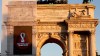 The Qatar 2022 World Cup logo, left, is displayed at the Arch of Peace, on the occasion of its worldwide launch, in Milan, Italy, Tuesday, Sept. 3, 2019. (AP Photo/Luca Bruno)
