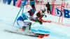 Slovakia's Petra Vlhova, foreground, and United States' Mikaela Shiffrin compete in a women's World Cup parallel slalom, in St. Moritz, Switzerland, Sunday, Dec. 9, 2018. (AP Photo/Marco Trovati)
