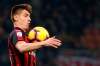 AC Milan's Krzysztof Piatek goes for the ball during the Serie A soccer match between AC Milan and Empoli, at the San Siro Stadium in Milan, Italy, Friday, Feb. 22, 2019. (AP Photo/Antonio Calanni)