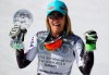 United States' Mikaela Shiffrin holds the women's World Cup slalom' discipline trophy, at the alpine ski, World Cup finals in Soldeu, Andorra, Saturday, March 16, 2019. (AP Photo/Alessandro Trovati)