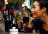 Michel Spingler / The Canadian Press
Nora Boutemeur enjoys a glass of Beaujolais Nouveau in Lille, northern France, Thursday, Nov. 21, 2013. The wine world's best-known party is beginning, the ritual uncorking of Beaujolais Nouveau every November. That's both a curse and a blessing for the famed French region and its lesser-known yet finer wines.