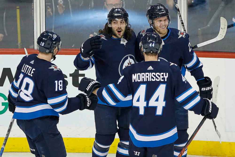 THE CANADIAN PRESS/John Woods
Winnipeg Jets' Mathieu Perreault has scored goals in five consecutive games going into Thursday's match against the Sharks.