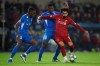 Liverpool's Mohamed Salah, right, vies for the ball with Genk's Jhon Lucumi, left, and Carlos Cuesta during a Champions League group E soccer match between Genk and Liverpool at the KRC Genk Arena in Genk, Belgium, Wednesday, Oct. 23, 2019. Salah scored once in Liverpool's 4-1 victory. (AP Photo/Francisco Seco)