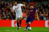 Barcelona's Lionel Messi, right, vies for the ball with Sevilla's Daniel Carrico during Spanish La Liga soccer match between Barcelona and Sevilla at the Camp Nou stadium in Barcelona, Sunday, Oct. 6, 2019. (AP Photo/Joan Monfort)