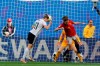 Germany's Alexandra Popp, left, heads the ball against Spain's Irene Paredes, right, and Spain goalkeeper Sandra Panos, background, before teammate Germany's Sara Daebritz scored the opening goal during the Women's World Cup Group B soccer match between Spain and Germany at Stade du Hainau in Valenciennes, France, Wednesday, June 12, 2019. (AP Photo/Michel Spingler)