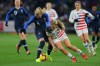 US midfielder Lindsey Horan, right, battles for the ball with France midfielder Amandine Henry during a women's international friendly soccer match between France and United States at the Oceane stadium in Le Havre, France, Saturday, Jan. 19, 2019. France won 3-1. (AP Photo/David Vincent)