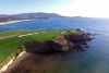 This Nov. 8, 2018 photo shows an aerial view of the sixth and seventh holes of the Pebble Beach Golf Links in Pebble Beach, Calif. The U.S. Open golf tournament is scheduled at Pebble Beach from June 13-16, 2019. (AP Photo/Terry Chea)