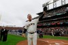 FILE - In this April 5, 2019, file photo, San Francisco Giants manager Bruce Bochy tips his cap to the crowd during introductions before the team's baseball game against the Tampa Bay Rays in San Francisco. Just as important to Bochy as capturing those three World Series titles in five years managing the Giants is his fairness and genuine way in dealing with the players who have helped him win during a decorated career on the dugout's top step. Everybody wants to do their best for the 64-year-old Bochy as he wraps up an accomplished 25-year managerial career that featured his first 12 seasons in San Diego and the last 13 with San Francisco. (AP Photo/Eric Risberg, File)