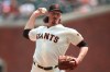 San Francisco Giants starting pitcher Jeff Samardzija throws in the first inning of a baseball game against the Philadelphia Phillies at Oracle Park in San Francisco, Saturday, Aug. 10, 2019. (AP Photo/Scot Tucker)