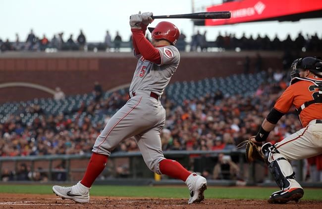 Cincinnati Reds' Nick Senzel follows through on a two-run triple against the San Francisco Giants during the second inning of a baseball game in San Francisco, Friday, May 10, 2019. (AP Photo/Jeff Chiu)
