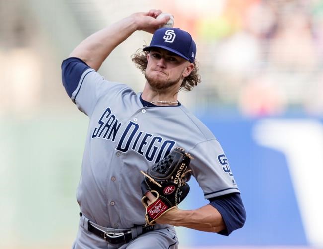 San Diego Padres starting pitcher Chris Paddack throws to a San Francisco Giants batter during the first inning of a baseball game Tuesday, June 11, 2019, in San Francisco. (AP Photo/John Hefti)