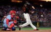 San Francisco Giants' Austin Slater, right, hits a grand slam in front of St. Louis Cardinals catcher Matt Wieters during the fourth inning of a baseball game in San Francisco, Saturday, July 6, 2019. (AP Photo/Jeff Chiu)