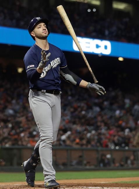 Milwaukee Brewers' Ryan Braun tosses his bat after striking out against the San Francisco Giants during the fifth inning of a baseball game in San Francisco, Friday, June 14, 2019. (AP Photo/Jeff Chiu)