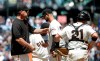 San Francisco Giants pitcher Tyler Beede, center, hands the ball to manager Bruce Bochy, left, as he is relieved during the sixth inning of a baseball game against the Chicago Cubs in San Francisco, Wednesday, July 24, 2019. Also pictured at right is catcher Stephen Vogt. (AP Photo/Jeff Chiu)