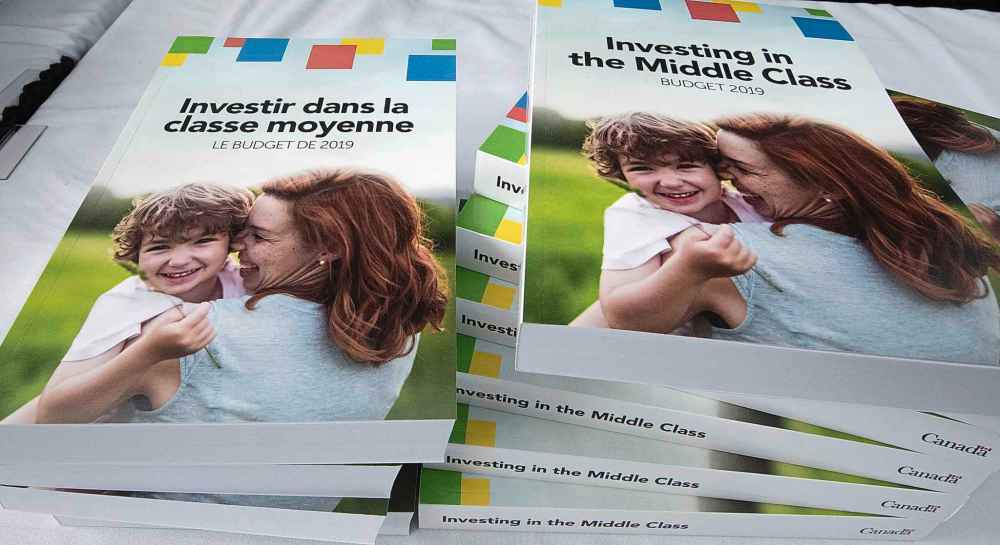 Fred Chartrand / The Canadian Press
Copies of the 2019 budget booklet are stacked at a lockup session with experts and reporters in Ottawa on Tuesday, March 19, 2019.