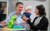 Paul Chiasson / The Canadian Press
Conservative leader Andrew Scheer chats with a mother holding her child while visiting a daycare in Toronto, on Thursday.
