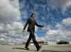 THE CANADIAN PRESS/Adrian Wyld
Liberal Leader Justin Trudeau walks to the campaign plane at the airport in Toronto, Monday September 21, 2015.