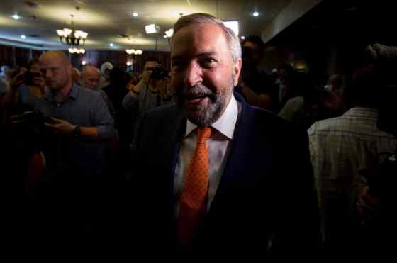 NDP Leader Tom Mulcair arrives for a campaign stop in Surrey, B.C., on Wednesday August 19, 2015. (THE CANADIAN PRESS/Darryl Dyck)