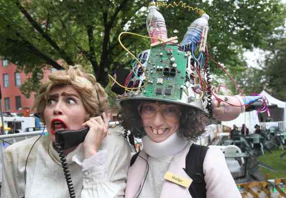 JOE BRYKSA / WINNIPEG FREE PRESSTaffy Allie Menzimer and Madge Janessa Johnsrude help kick off the 29th annual Winnipeg Fringe Theatre Festival at Old Market Square today. The festival showcases 170 performances over the next 12 days.