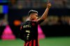 Atlanta United forward Josef Martinez looks to the crowd after scoring a goal during the second half of an MLS soccer game against the Los Angeles Galaxy, Saturday, Aug. 3, 2019, in Atlanta. (AP Photo/Andrea Smith)